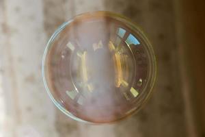 Blown single soap bubble in air