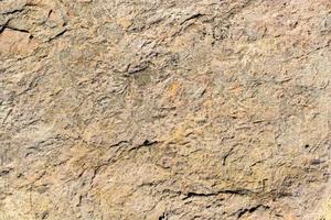 superficie de roca o piedra como textura de fondo foto
