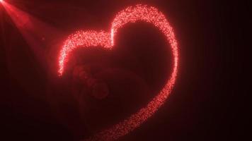 Abstract glowing festive heart love red from lines of magic energy from particles and dots on a dark background for Valentine's Day. Abstract background. Video in high quality 4k, motion design