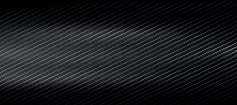 Panoramic dark carbon fiber texture with highlights - Vector