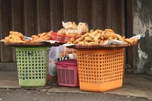 Fried snacks are sold at roadside stalls photo