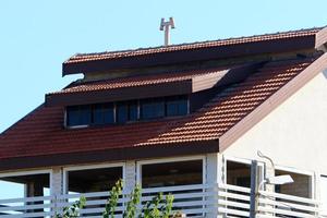 Tiled roof on a residential building in Israel. photo