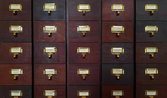 Brown wooden box or cabinet for receive letter or information document. Vintage or modern locker and Group of classic object. photo