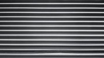 línea de patrón de obturador de ventana para fondo en tono blanco y negro o monocromo. pared de textura o papel tapiz foto