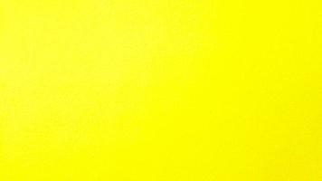 pared pintada de amarillo para el fondo. color colorido o pastel de papel tapiz de hormigón. foto