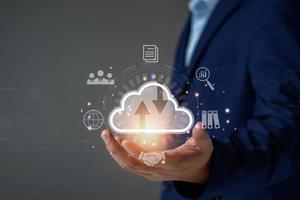 Businessman using cloud technology connect business data. Cloud computing diagram show on hand. Internet Cloud technology. Digital Data storage. Networking and internet service for business concept. photo