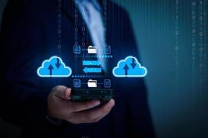 Businessman using cloud technology connect business data. Cloud computing diagram show on hand. Internet Cloud technology. Digital Data storage. Networking and internet service for business concept. photo