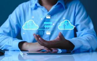 Businessman using cloud technology connect business data. Cloud computing diagram show on hand. Internet Cloud technology. Digital Data storage. Networking and internet service for business concept. photo