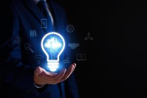 Businessman using cloud technology connect business data. Cloud computing concept idea show on hand. Internet Cloud technology. Digital Data storage. Network and internet service for business concept. photo