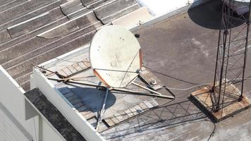 Old big telecommunication satellite dish. photo