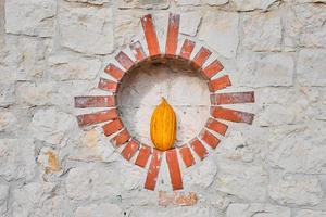 Ripe juicy turkish melon in a round niche on a white stone wall, photo with copy space, organic fruit market advertising idea. Concept for background or article