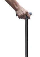Senior hand holding a walking stick or a cane, isolated on white background. Medical and healthcare concept. Back of hand side. photo