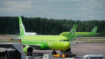 MOSCOW, RUSSIAN FEDERATION JULY 24, 2021 - Domodedovo airport, airline planes S7 are at the airport video