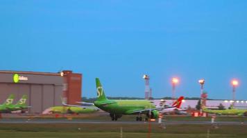 NOVOSIBIRSK, RUSSIA JUNE 17, 2020 - S7 Airlines plane takes off in the early morning from Tolmachevo International Airport, Novosibirsk. Airport traffic, morning flights