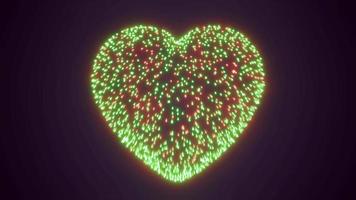 conjunto abstrato de fogos de artifício de férias de fogos de artifício para o dia dos namorados na forma de um coração de partículas brilhantes e linhas de energia mágica. fundo abstrato. vídeo em 4k de alta qualidade, design de movimento video