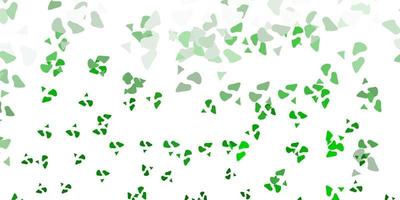 Light green vector backdrop with chaotic shapes.