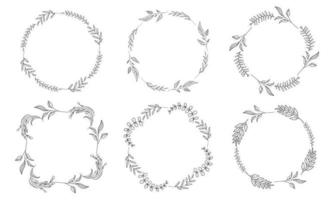 conjunto dibujado a mano de coronas florales vector