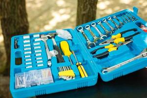 background of the interior of a toolbox filled with lots of tools photo