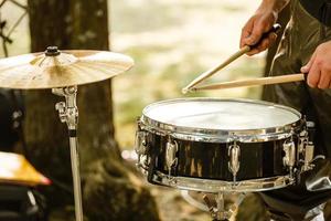 drums-set with sticks on snare-drums photo