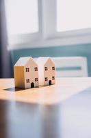 Signing home sales and insurance contracts with real estate agents, signing contracts to know the terms of buying and selling homes and real estate, contract signing ideas. photo