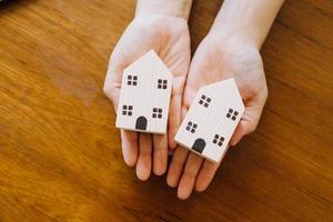 Signing home sales and insurance contracts with real estate agents, signing contracts to know the terms of buying and selling homes and real estate, contract signing ideas. photo