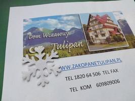 KYIV, UKRAINE - JANUARY 4, 2023 Catalogs and promotional offers of the resort Zakopane, Poland photo