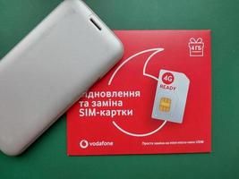 KYIV, UKRAINE - JANUARY 4, 2023 Starter packages for mobile cellular services photo