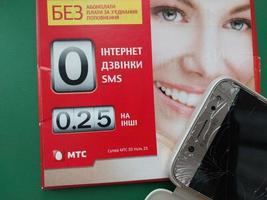 KYIV, UKRAINE - JANUARY 4, 2023 Starter packages for mobile cellular services photo