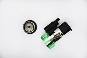 Cigarette lighter with green backlight. Spare part for the car. The electric cigarette lighter is disassembled. photo