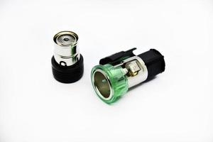 Cigarette lighter with green backlight. Spare part for the car. The electric cigarette lighter is disassembled. photo