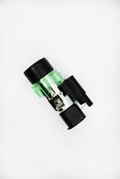 Cigarette lighter with green backlight. Spare part for the car. The electric cigarette lighter is disassembled. photo