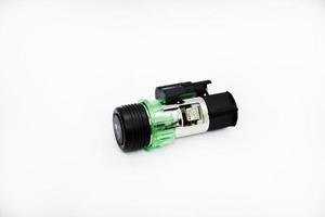 Cigarette lighter with green backlight. Spare part for the car. The electric cigarette lighter is disassembled. photo