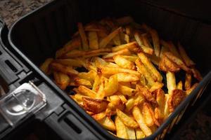 Air Fryer homemade grilled potatoes. photo