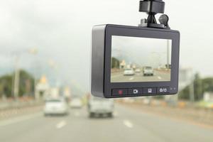 Car CCTV camera video recorder for driving safety on the road photo