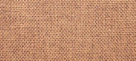 Fondo de textura de tela de lona de lino marrón foto