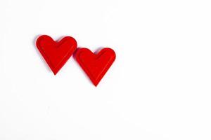amor corazones sobre fondo de textura de madera. concepto de tarjeta de San Valentín. corazón para el fondo del día de san valentín. foto