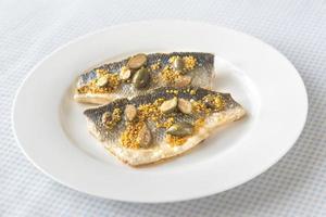 Baked sea bass with capers photo