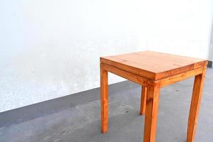 Wooden stool on white background photo