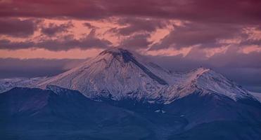 Avachinsky volcano in Kamchatka in the autumn with a snow-covered top photo