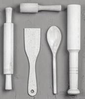 wooden spoons, spatulas and a rolling pin. Close up photo