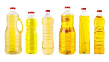 conjunto de botellas de aceite de girasol aislado en blanco foto