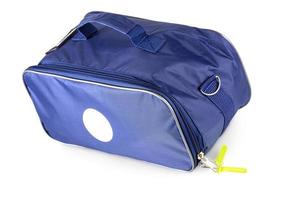 blue medical bag with red cross isolated on white photo