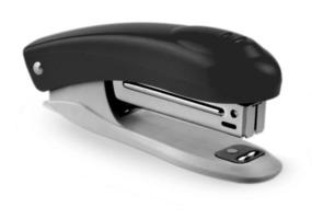 stapler isolated on white background. Selective focus photo