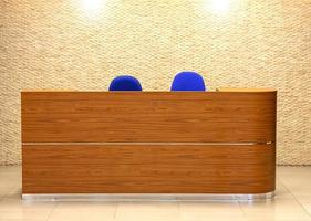 Reception desk in the hall of the office photo