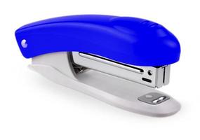 Blue stapler isolated on white background. Selective focus photo