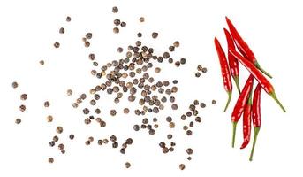 balck pepper and red chili peppers isolated on white background. photo