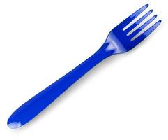 colored plastic fork and knife isolated on white background. photo