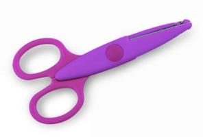 Colore baby scissors cut out on a white background. View from above. photo