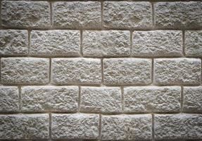 close up white brick wall, texture of whitened masonry as a background photo