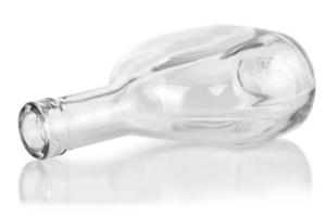 empty clear cognac bottle isolated on white background photo